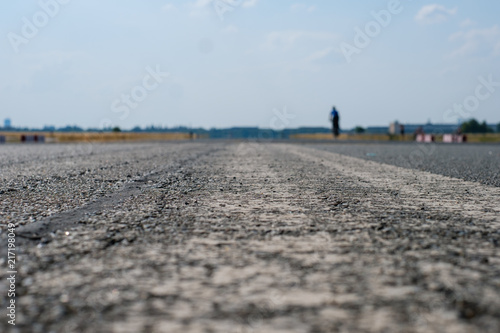 empty asphalt road closeup - runway macro