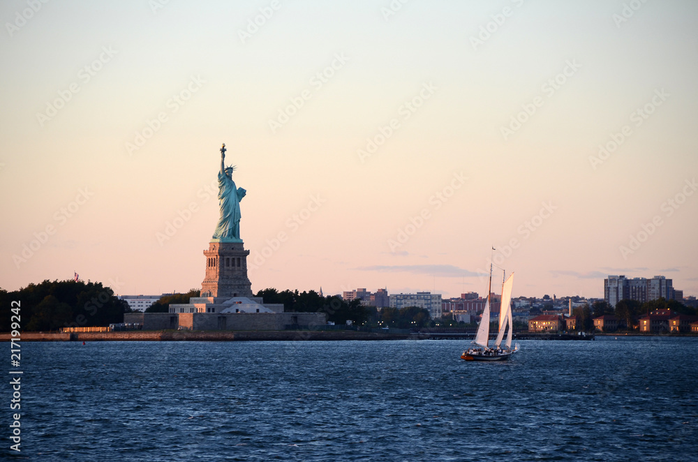 Sunset over Statue of Liberty, New York