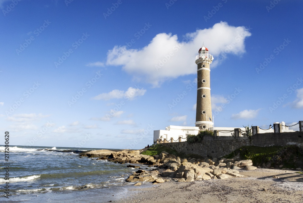 Sunny day and view to the famous lighthouse on Jose Ignacio beach, Punta del Este, Uruguay.