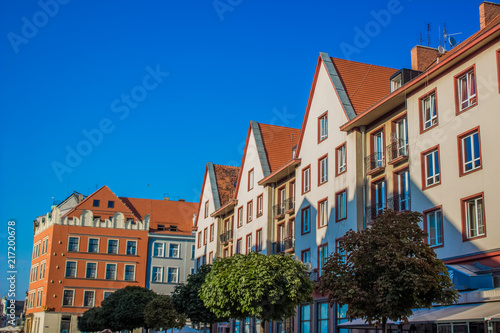 soft focus architecture concept of old city street small colorful houses facade in bright summer day time © Артём Князь