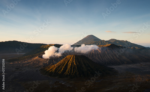 Volcano eruption with the sun shining down on the mountain in morning  Ring of fire zone  Bromo  Batok and Semeru volcano  Java island  Indonesia  Asia.