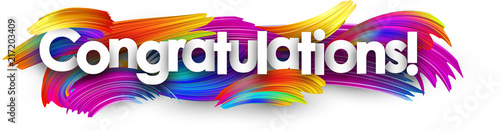 Congratulations paper banner with colorful brush strokes. photo