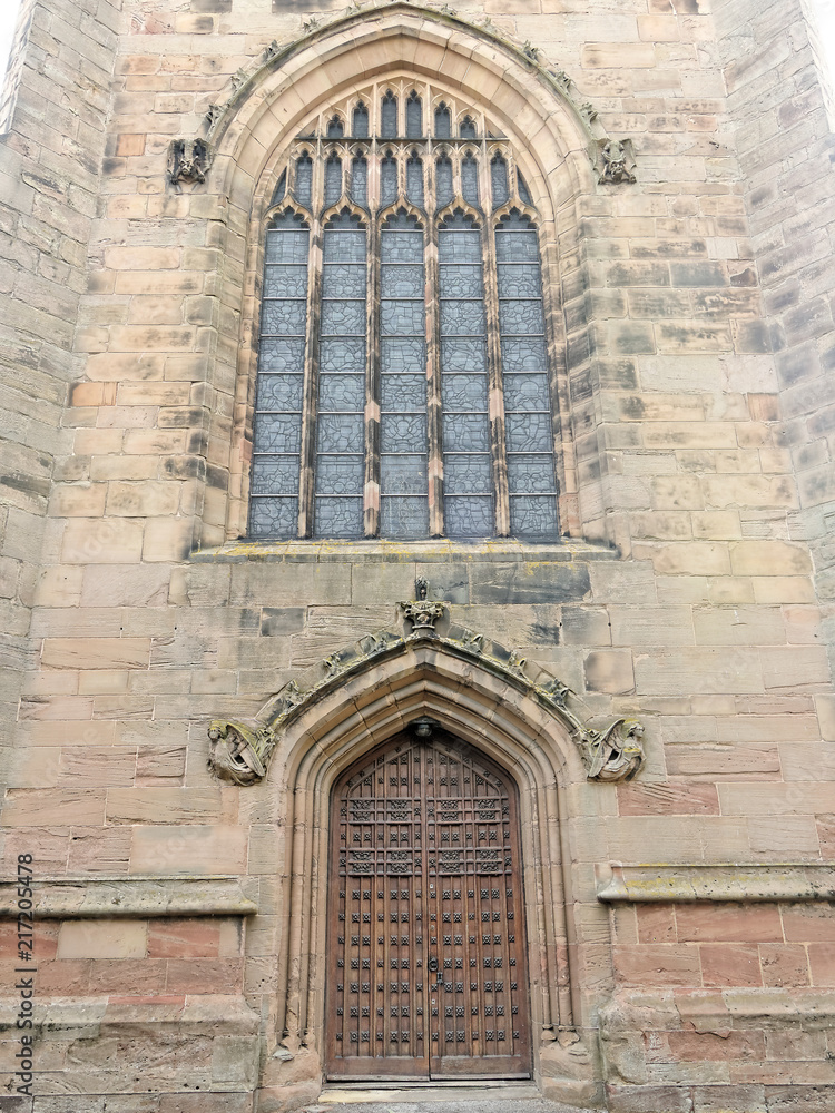 Beautiful stained glass window and main entrance to Coleshill Parish Church St. Peter & St. Paul. Beautiful stained glass window and main entrance to Coleshill Parish Church St. Peter & St. Paul.