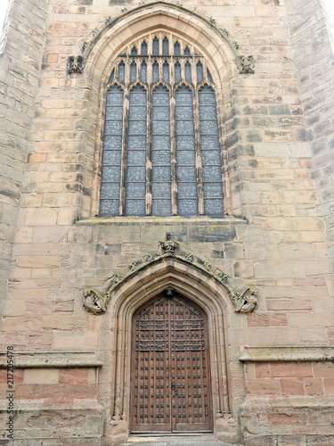 Beautiful stained glass window and main entrance to Coleshill Parish Church St. Peter & St. Paul.