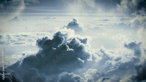 Flying through the clouds to Logo. Dramatic cinema style intro for movies. photo