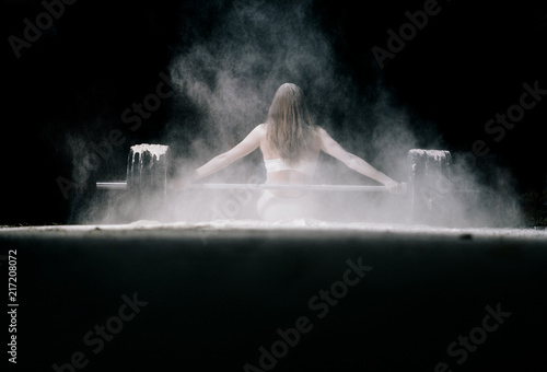 Woman working out with weig...