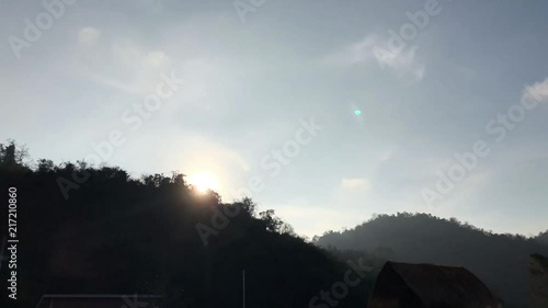 The timelapse of sunrise with mountain. photo