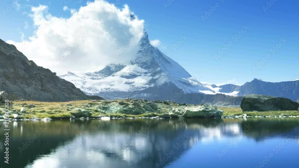 time lapse of Matterhorn in lake Riffelsee, Zermatt, Switzerland time lapse of Matterhorn in lake Riffelsee, Zermatt, Switzerland