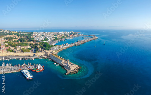 Aerial birds eye view drone photo of Rhodes city island, Dodecanese, Greece. Panorama with Mandraki port, lagoon and clear blue water. Famous tourist destination in South Europe © oleg_p_100