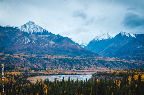 Glenn highway. Matanuska river, mountains covered with a snow, autumn trees. Alaska. © David Pastyka