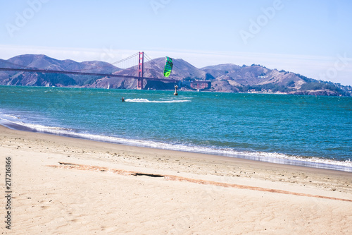 Kiteboarding next to Golden Gate Bridge in San Francisco, California, USA.