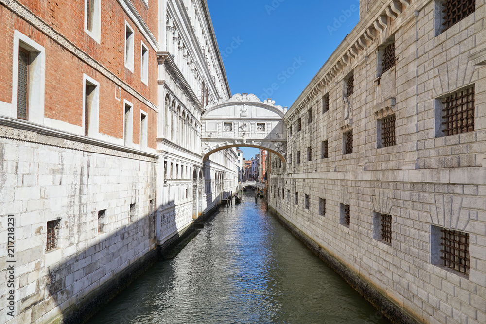 Bridge of Sighs and calm water in the canal, nobody in Venice, Italy