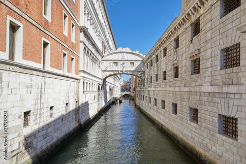 Bridge of Sighs and calm water in the canal, nobody in Venice, Italy