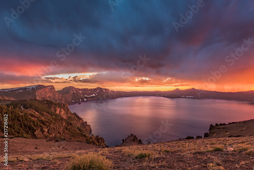 Orange Sunset and Storm Clouds Over Crater Lake