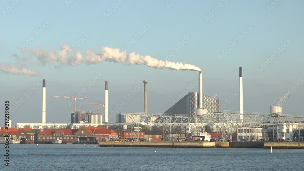 Industrial factories, blowing smoke in slow motion. Industrial factories, blowing smoke in slow motion.