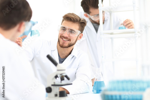 closeup.smiling team of biologists in the lab