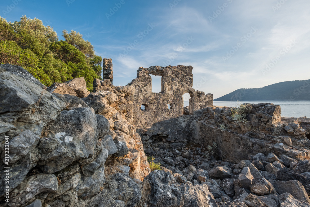 Ruined stone building in Gemiler island , Kayavillage, Fethiye, Turkey