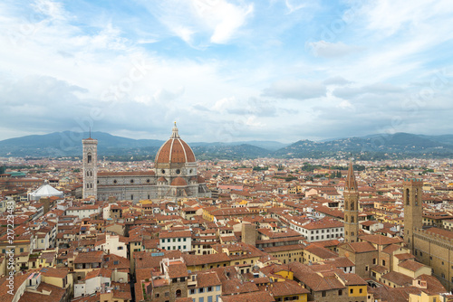 Top panoramic cityscape view of Florence, capital of Tuscany region,plenty of roof top renaissance architectures and Piazza del Duomo, Cathedral of Santa Maria del Fiore is major tourist attraction.