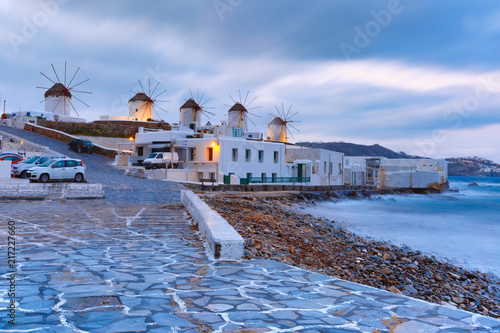 Famous view, Traditional windmills at sunrise in Mykonos City, Chora, on the island Mykonos, The island of the winds, Greece