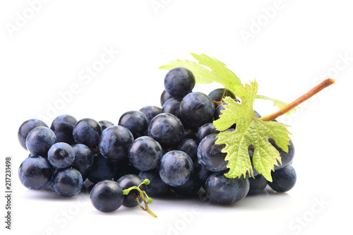 Basket of grapes on a white background