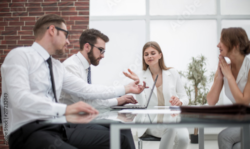 business team using laptop to get new informatio