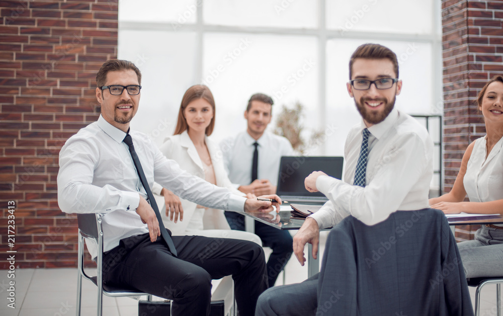 Manager and business team sitting at their Desk Manager and business team sitting at their Desk