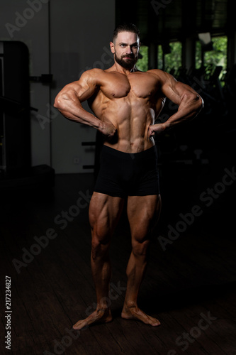 Man In Gym Showing His Well Trained Body