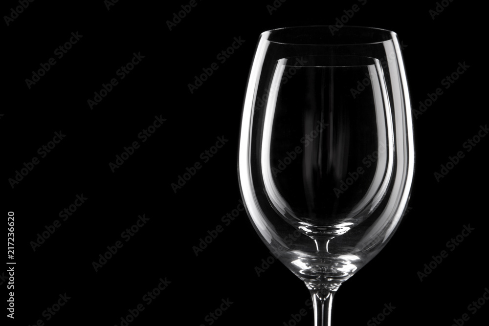 transparent wine glass on the black transparent wine glass on the black