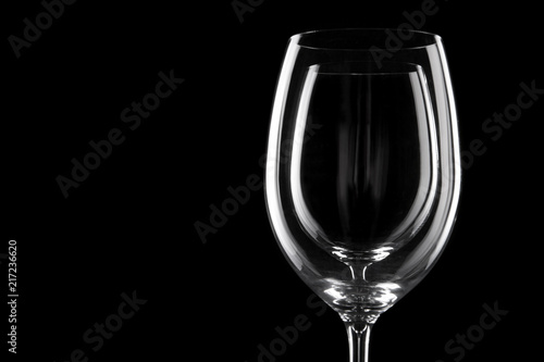 transparent wine glass on the black