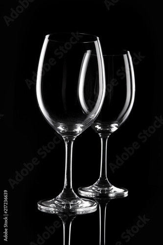 transparent wine glass on the black