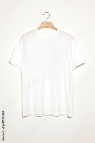 shirts with wood hanger isolated white.
