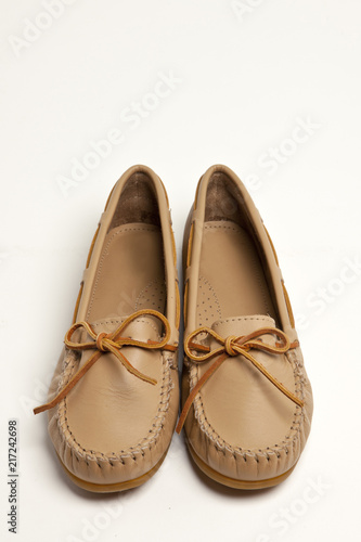 brown leather shoes on the white background.