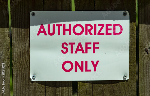 sign says authorized staff only