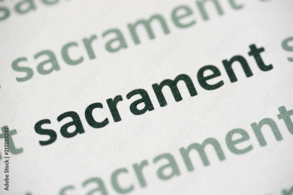 word sacrament printed on paper macro word sacrament printed on paper macro