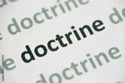 word doctrine printed on paper macro