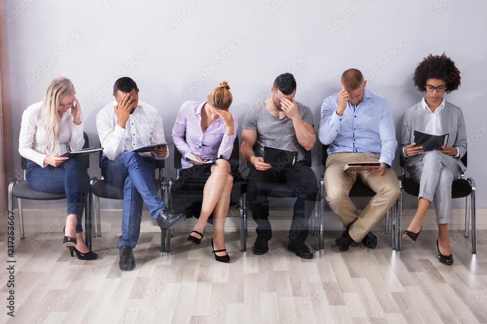 Bored People Waiting For Job Interview Bored People Waiting For Job Interview