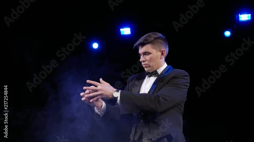 The appearance and disappearance of white beads in their hands magician
