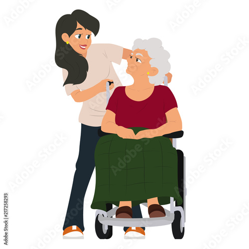 A social worker helps a grandmother in a wheelchair.