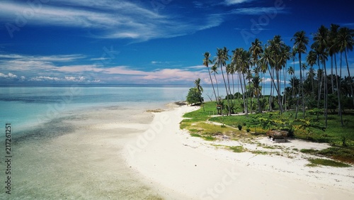 one of the white sand beaches of the tropical islands around Sabah, Borneo, Malaysia photo
