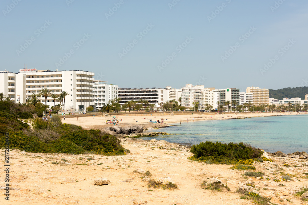 View of the skyline with the hotels on the promenade with beach in Cala Millor on the holiday island Mallorca in the Mediterranean Sea