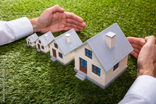 Person Protecting Increasing Houses