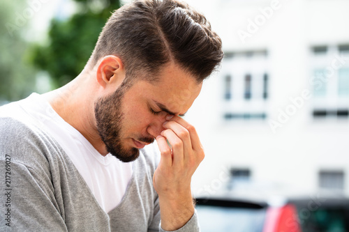 Man Suffering From Headache