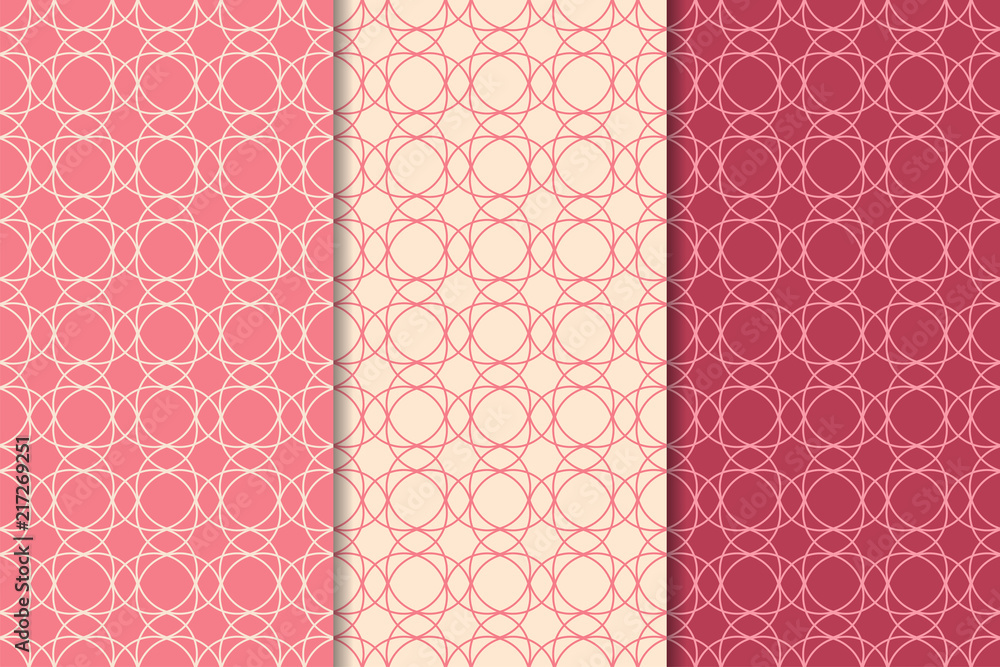 Cherry red geometric ornaments. Set of seamless patterns Cherry red geometric ornaments. Set of seamless patterns