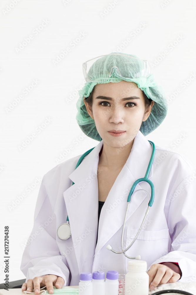 Beautiful portrait of doctor woman with stethoscope and medical equipment on white background.Copy space. Beautiful portrait of doctor woman with stethoscope and medical equipment on white background.Copy space.