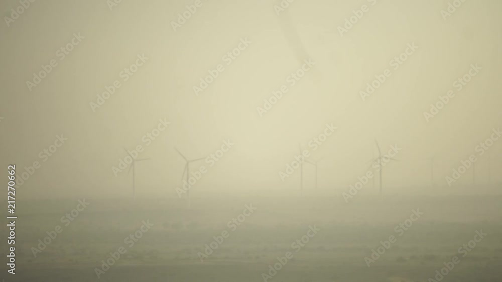 Windmills in haze, beauty shot Windmills in haze, beauty shot