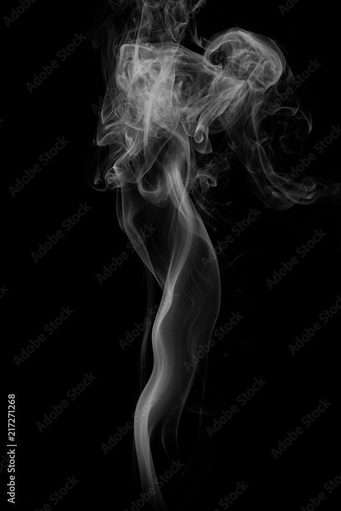 Obraz premium movement of smoke on black background, smoke background,
