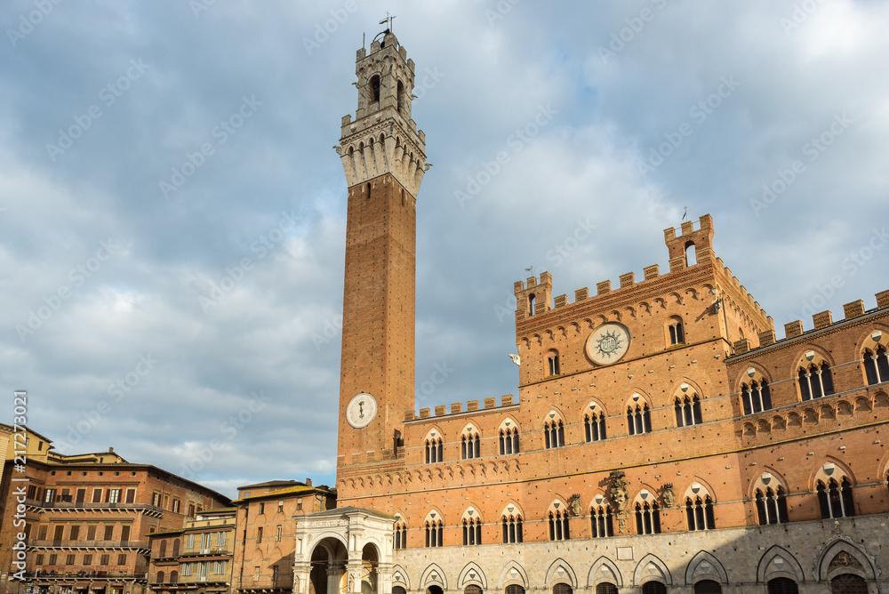 Mangia Tower and Palazzo Pubblico, located in Piazza del Campo, Siena, Italy