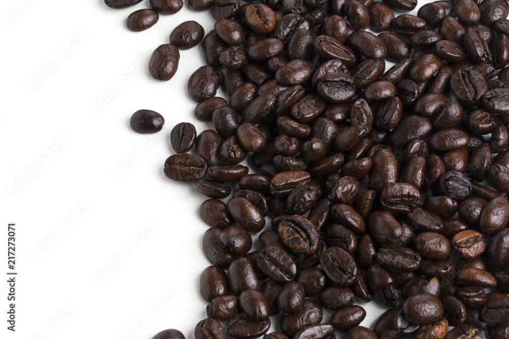 Roasted coffee beans isolated on pure white background for content using.