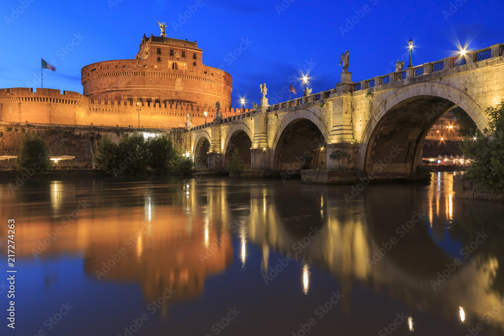 Castel Santangelo in Rome reflected on the Tiber River at sunset