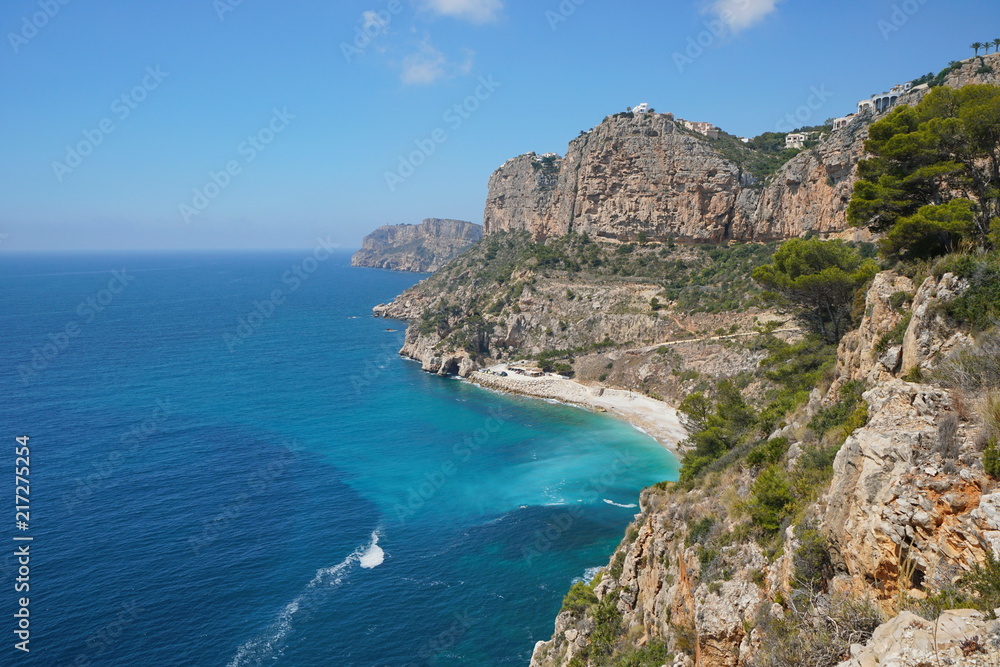 Coastal cliff with beach at the bottom, Cala del Moraig, Benitachell, Mediterranean sea, Costa Blanca, Alicante, Valencia, Spain